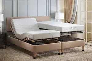 Carers' height adjustable bed