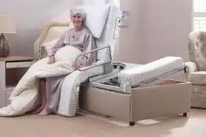 A woman using a turning bed